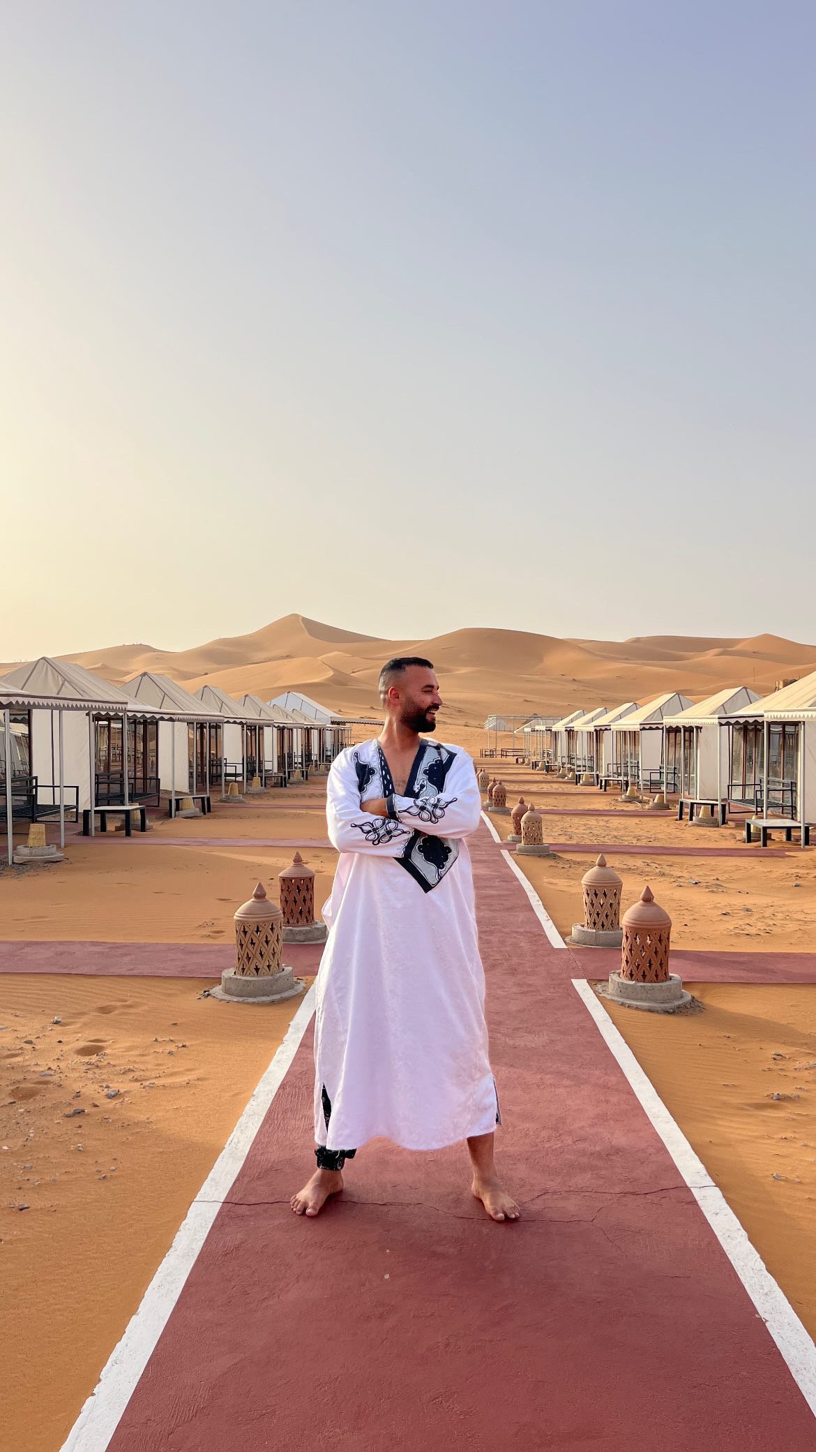 a man in the sahara desert of morocco